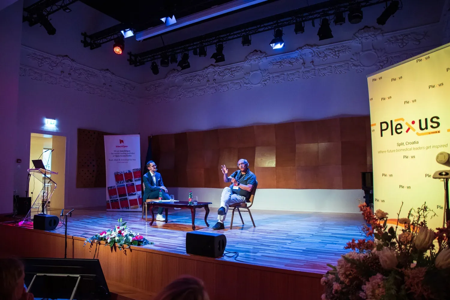 A panel session in front of the Plexus audience